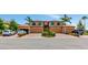 A beautiful two-story home featuring well-maintained landscaping, brick paved driveways, and attached two car garages at 6406 Grand Estuary Trl # 102, Bradenton, FL 34212