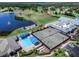 Aerial view of the pool, tennis courts and bocce ball court at Tara Golf & Country Club at 6612 Butlers Crest Dr, Bradenton, FL 34203