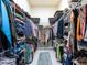 Spacious walk-in closet with ample shelving and hanging space, offering organized storage for clothes and accessories at 6612 Butlers Crest Dr, Bradenton, FL 34203