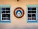 Exterior detail of Jiggs Landing Outpost with teal trim and the outpost logo at 6612 Butlers Crest Dr, Bradenton, FL 34203