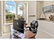Bright office space with large windows, desk, and chair; perfect for working from home at 6612 Butlers Crest Dr, Bradenton, FL 34203