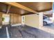Assigned covered parking area with a storage closet and convenient access to unit at 7201 Curtiss Ave # 2D, Sarasota, FL 34231