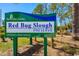A welcoming sign for Red Bug Slough Preserve in Sarasota County, inviting nature enthusiasts to explore and enjoy at 7201 Curtiss Ave # 2D, Sarasota, FL 34231