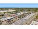 Aerial shot of a street with a mix of commercial buildings and businesses in an urban setting at 7203 Curtiss Ave # 3D, Sarasota, FL 34231