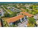 An aerial view of the condominium complex featuring a well-maintained landscape and exterior architecture at 7203 Curtiss Ave # 3D, Sarasota, FL 34231
