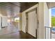 Building elevator access on an exterior walkway at 7203 Curtiss Ave # 3D, Sarasota, FL 34231