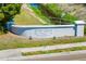 Entrance sign for 'Gulf Gate' with neatly manicured landscaping at 7203 Curtiss Ave # 3D, Sarasota, FL 34231