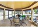 Cozy gazebo featuring a table and chairs, perfect for outdoor dining or relaxation at 7203 Curtiss Ave # 3D, Sarasota, FL 34231