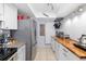 Functional kitchen with stainless steel appliances, granite countertops, and ample storage space at 7203 Curtiss Ave # 3D, Sarasota, FL 34231