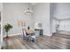 Dining area features a chandelier, large windows and open floorplan at 75 Inlets Blvd # 75, Nokomis, FL 34275