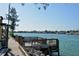 Picturesque waterfront dock with views of tranquil waters and scenic shoreline at 75 Inlets Blvd # 75, Nokomis, FL 34275