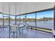 Beautiful screened lanai overlooking pond and community landscape at 75 Inlets Blvd # 75, Nokomis, FL 34275