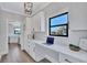 Convenient office space with white cabinets, quartz counters, and backyard views at 75 Inlets Blvd # 75, Nokomis, FL 34275