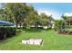 Lush green recreation area features a horseshoe pit and plenty of shade at 75 Inlets Blvd # 75, Nokomis, FL 34275