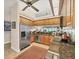 Bright kitchen features stainless steel appliances, granite countertops, and ample cabinet space at 7724 Palm Aire Ln, Sarasota, FL 34243