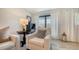 Bright and airy living room with modern furniture and a calming color scheme at 9008 White Sage Loop # 3605, Lakewood Ranch, FL 34202