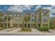 Charming townhouse exterior showcasing well-maintained landscaping and inviting curb appeal at 9008 White Sage Loop # 3605, Lakewood Ranch, FL 34202