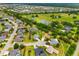 Community aerial view showcases the neighborhood's layout, ponds, and green spaces at 9101 Yarberry St, Sarasota, FL 34240