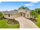 Beautiful single Gathering home with a well manicured lawn, complemented by a circular driveway at 9101 Yarberry St, Sarasota, FL 34240