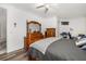 Spacious main bedroom with wooden furniture and wood-look flooring at 9101 Yarberry St, Sarasota, FL 34240