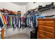 Organized walk-in closet with shelving and hanging storage at 9101 Yarberry St, Sarasota, FL 34240
