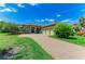 Beautiful single Gathering home with lush landscaping and a paver driveway at 9734 Carnoustie Pl, Bradenton, FL 34211
