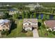 Beautiful home with manicured lawn, landscaping and scenic water view in a desirable neighborhood at 13116 Bliss Loop, Bradenton, FL 34211