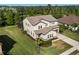 Stunning home with well-manicured lawn and landscaping near a serene lake at 13116 Bliss Loop, Bradenton, FL 34211