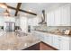 Gourmet kitchen features a large island, stainless steel appliances, and custom cabinets at 13116 Bliss Loop, Bradenton, FL 34211