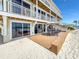 Beachfront home featuring a spacious deck with a dining area and stunning ocean views at 101 66Th St # 1, Holmes Beach, FL 34217