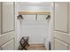 Spacious closet with wooden racks, room for storage and a light wood floor at 101 66Th St # 1, Holmes Beach, FL 34217