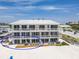 Charming multi-story condo featuring private outdoor decks for enjoying the picturesque beach setting at 101 66Th St # 1, Holmes Beach, FL 34217
