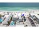 Stunning aerial view showcases beachfront property with a pool, parking, and direct access to the ocean at 101 66Th St # 1, Holmes Beach, FL 34217