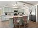 Charming kitchen with island seating, stainless appliances, and lots of cabinet space at 101 66Th St # 1, Holmes Beach, FL 34217