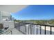 Relaxing balcony space with black iron railing and beautiful views of the water and marina at 101 S Gulfstream Ave # 5J, Sarasota, FL 34236