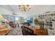 Spacious living room featuring a tile floor, a dining area and an open view of the balcony at 101 S Gulfstream Ave # 5J, Sarasota, FL 34236