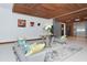 Beautiful lobby with modern decor, wooden ceilings, artwork, and contemporary seating area at 101 S Gulfstream Ave # 5J, Sarasota, FL 34236
