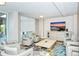 Clubhouse lounge with contemporary seating, media center, and tile flooring at 101 S Gulfstream Ave # 5J, Sarasota, FL 34236