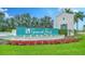 Grand Park entrance sign with manicured landscaping and palm trees at 10105 Canaveral Cir, Sarasota, FL 34241