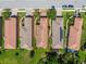 Aerial view showing the home's location within a well-manicured neighborhood with tiled roofs at 10205 Saint Francis Ter, Palmetto, FL 34221