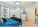 Inviting bedroom featuring a well-lit window, coordinated decor, and comfortable furnishings at 10205 Saint Francis Ter, Palmetto, FL 34221