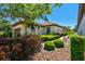 Beautiful landscaping surrounds this home's exterior, showing off the meticulously maintained yard and peaceful setting at 10205 Saint Francis Ter, Palmetto, FL 34221