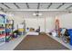 Spacious garage with ample storage space for tools, equipment, and room for parking a car at 10205 Saint Francis Ter, Palmetto, FL 34221