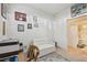 Additional view of the office space with a white futon and ample wall decor at 10205 Saint Francis Ter, Palmetto, FL 34221