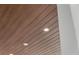 Beautiful ceiling with wood paneling and recessed lighting, adding a touch of sophistication at 111 Golden Gate Pt # 802Ph, Sarasota, FL 34236