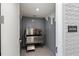 Convenient dog wash station with stainless steel tub and easy access, perfect for pet owners at 111 Golden Gate Pt # 802Ph, Sarasota, FL 34236