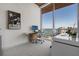 Bright office space with water views and modern desk setup at 111 Golden Gate Pt # 802Ph, Sarasota, FL 34236