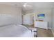 Spacious main bedroom with a TV, ensuite bathroom, and and closets at 113 Maple Ave, Anna Maria, FL 34216