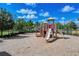 Community playground surrounded by a fence, providing a secure play area for families at 11847 Meadowgate Pl, Lakewood Ranch, FL 34211