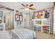 Themed bedroom with comfortable bed and desk, plus many soccer items decorating the walls at 11913 Blue Hill Trl, Bradenton, FL 34211